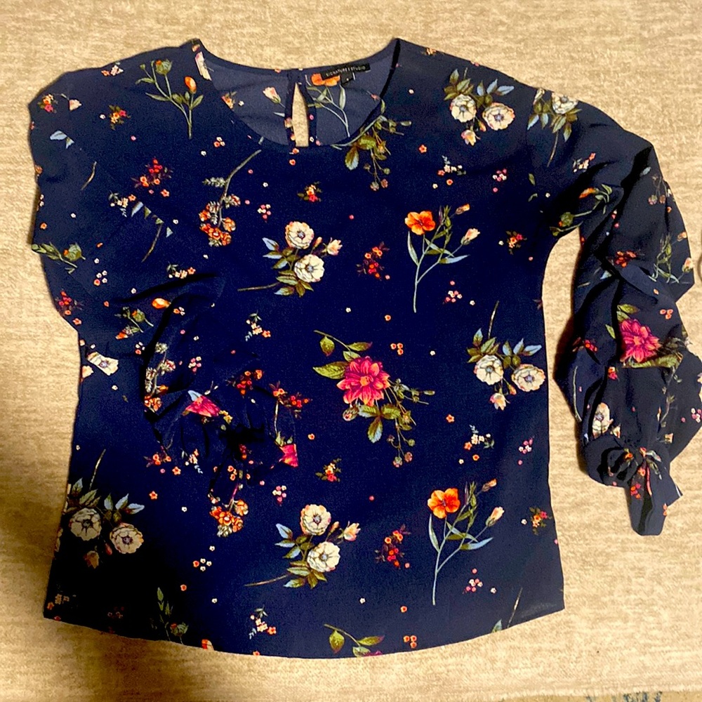 Ruffle sleeved, navy, floral top.